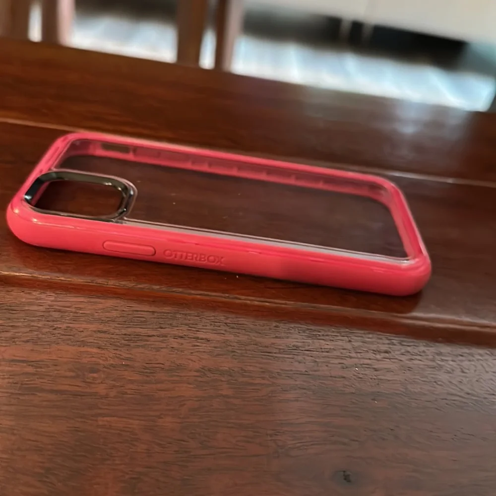 Otter box, clear back with bright pink sides, Gently used1 week, Excellent cond.